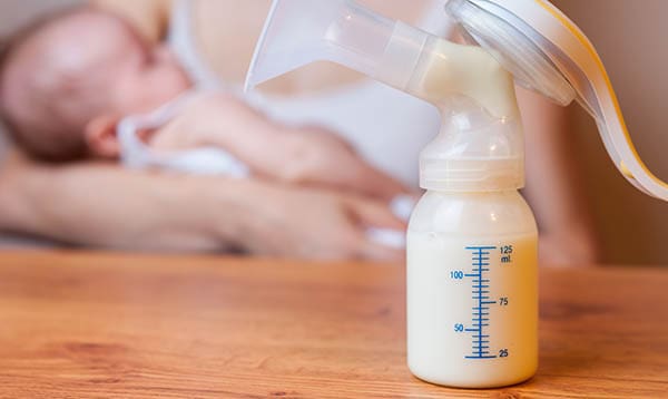 baby with pumped milk breastmilk nutrition