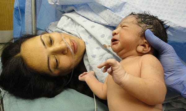 woman and baby after c-section