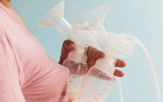 woman wondering about breast pumps and scales