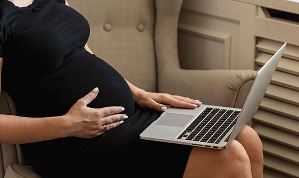 woman attending online childbirth education