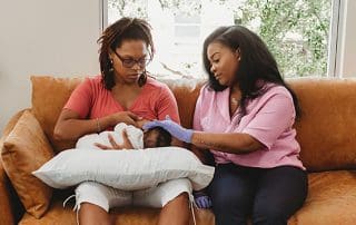 new mother with lactation consultant wondering what does a lactation consultant do?